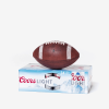 A football ball resting on top of a Coors Light beer case against a white background.